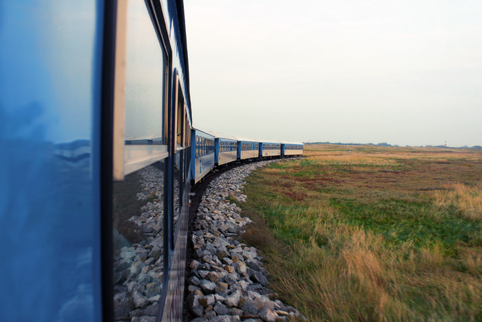 Fahrt mit der Inselbahn zum Westanleger