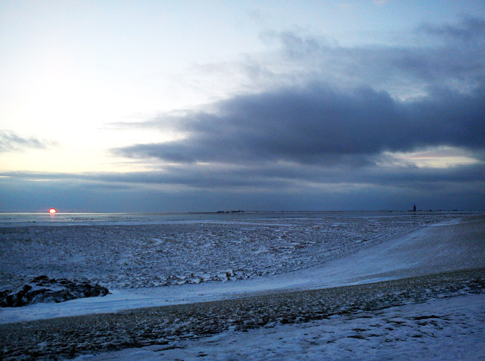 Sonnenuntergang vom Deich aus gesehen
