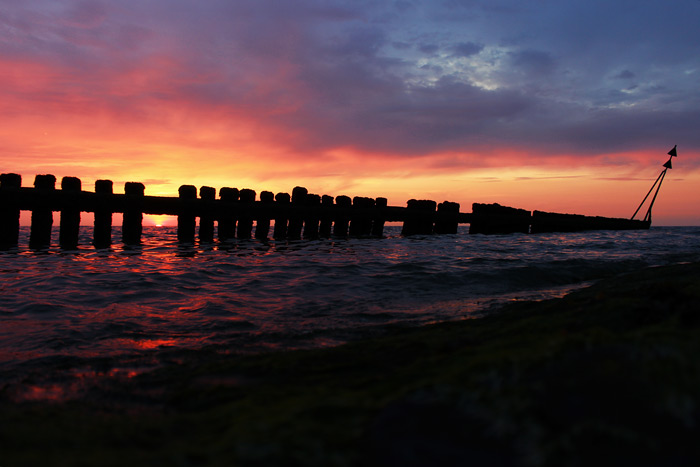 Sonnenuntergang von Buhne &raquo;M&laquo; aus beobachtet