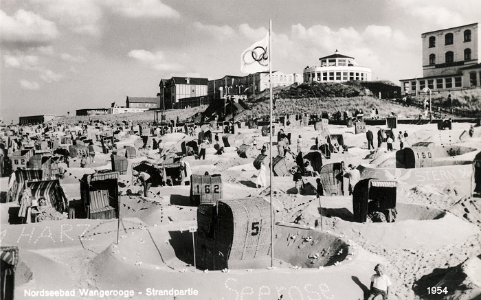 Strandpartie mit Olympischer Flagge